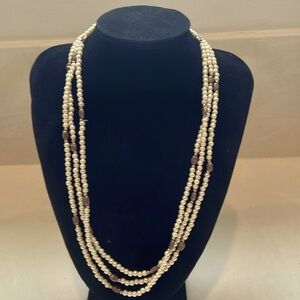 Women’s necklace. One continuous strand can be worn, single or tripled.